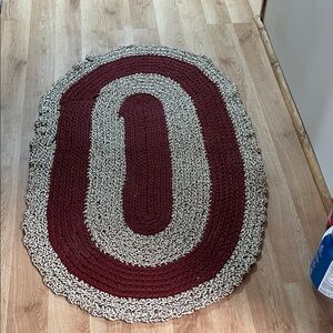 Elegant Burgundy and Cream Braided Rug
